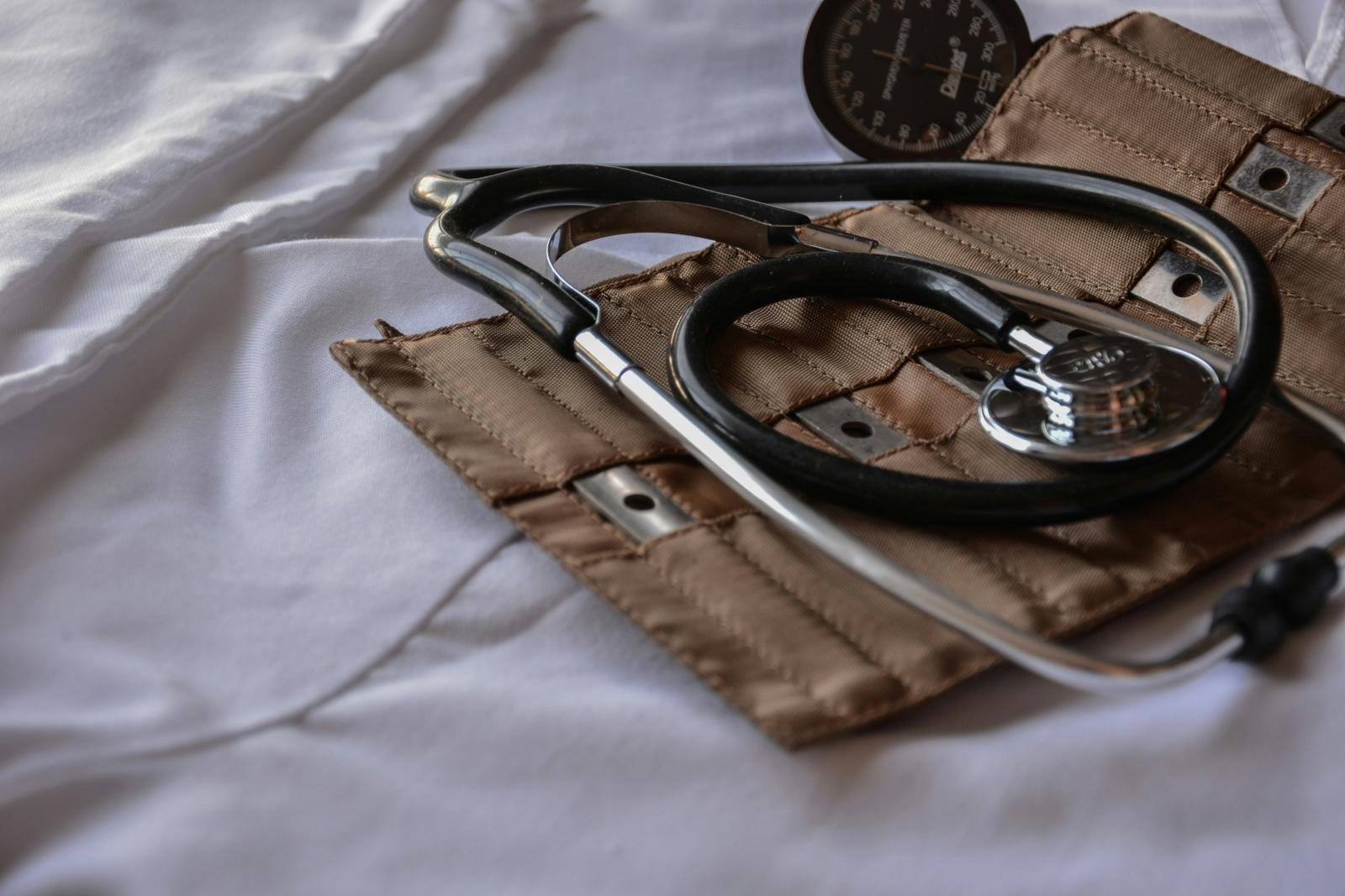 Doctors collaborating around exam-prep materials